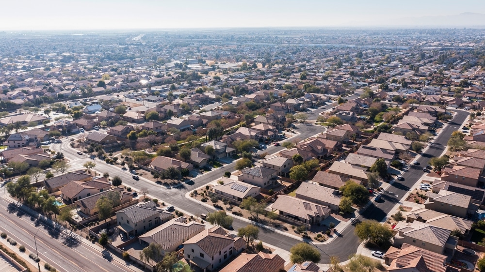 Afternoon,Aerial,View,Of,Sprawling,Suburban,Single,Family,Housing,In