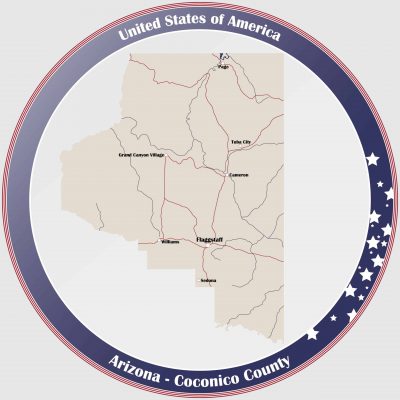 Round button with detailed map of Coconico County in Arizona, USA.