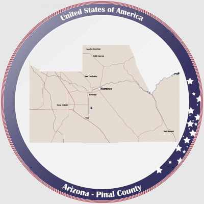 Round button with detailed map of Pinal County in Arizona, USA.