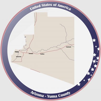 Round button with detailed map of Yuma County in Arizona, USA.